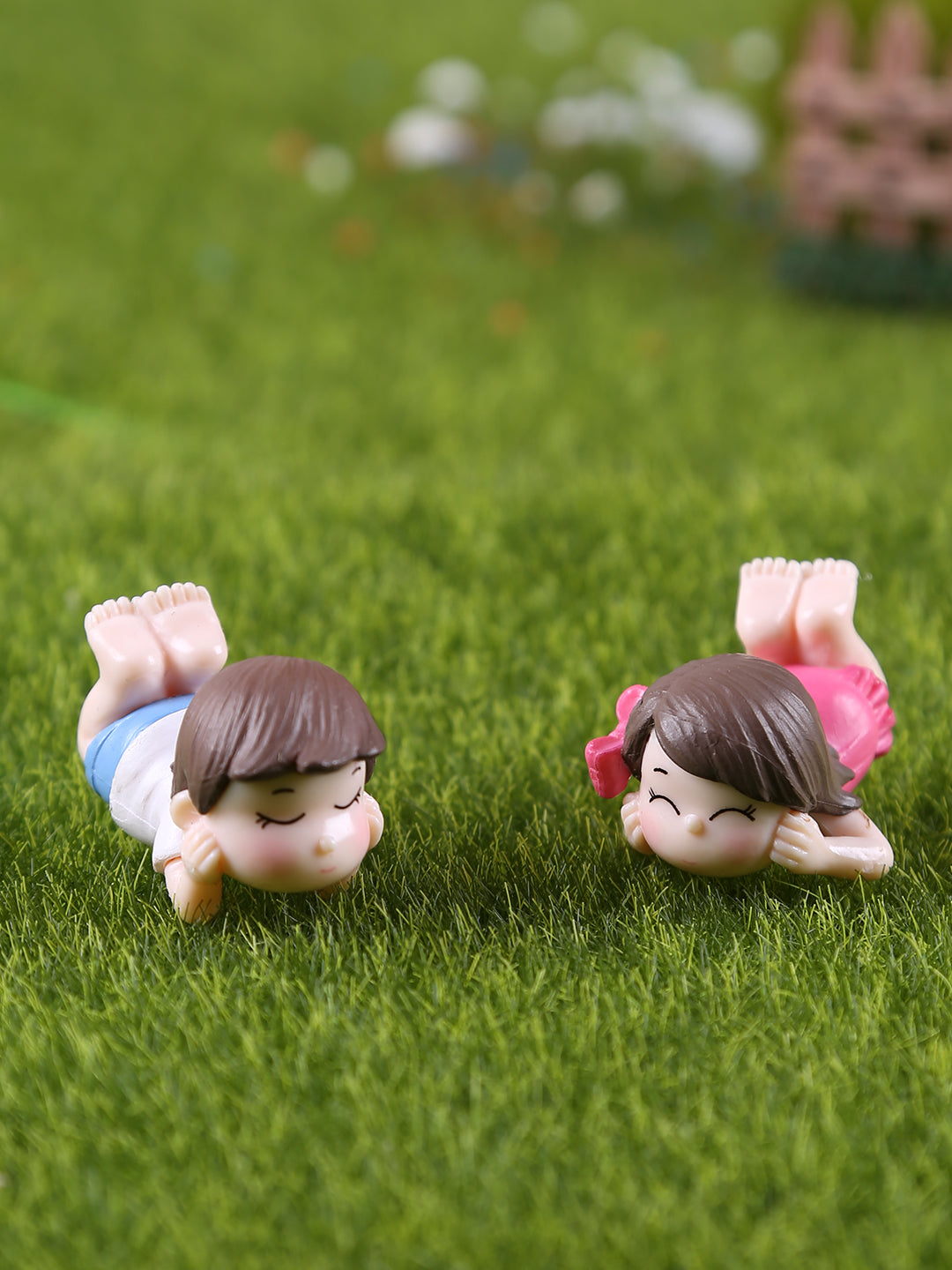 Baby Boy and Girl Resting and Contemplating Garden Toys 2pc