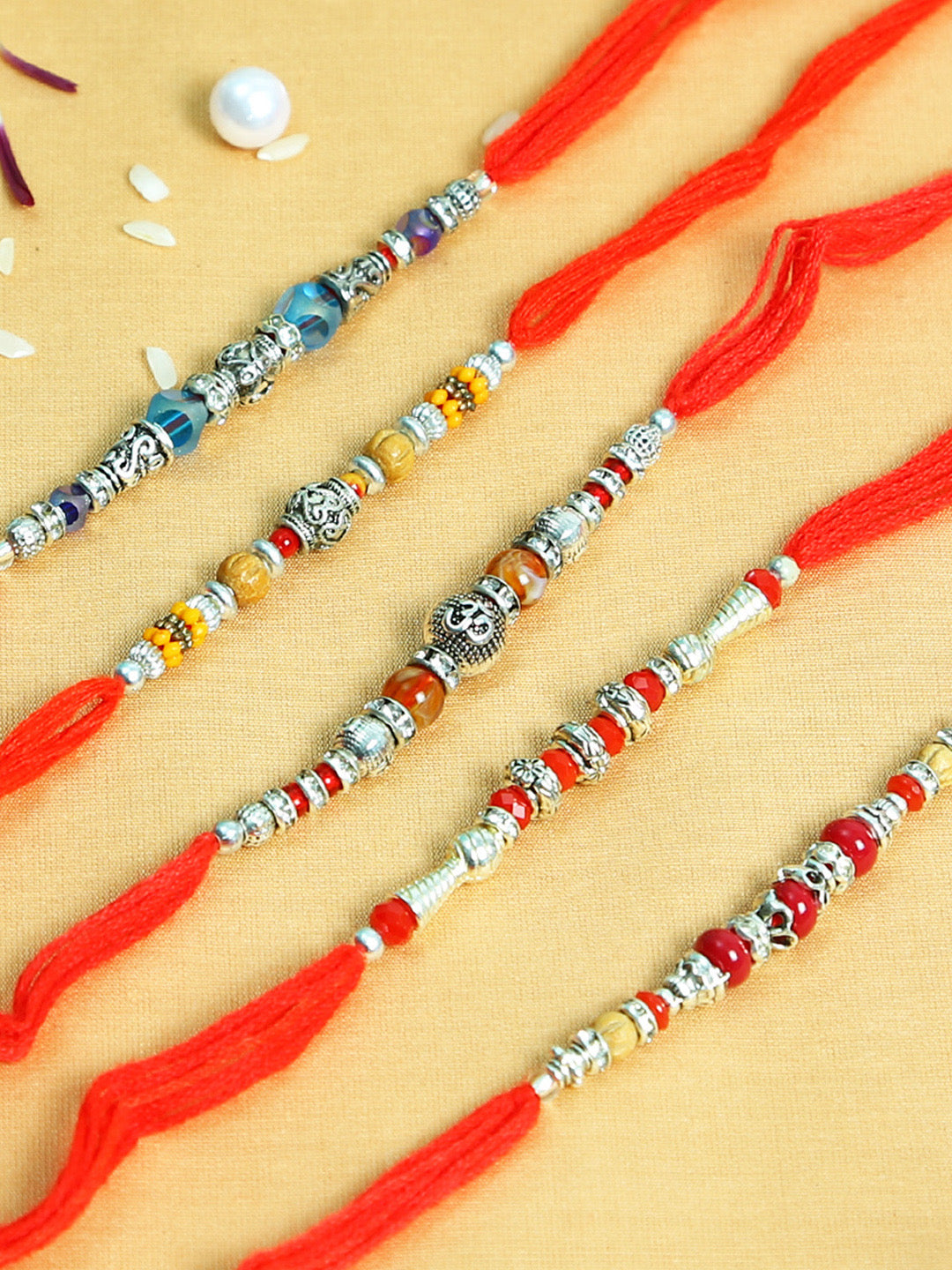 Beautiful Silver Beads Rakhi Set of Five - Only Rakhi (PST22812_5)