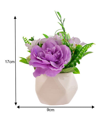 Artificial Flowers In A Diamond Pattern Planter