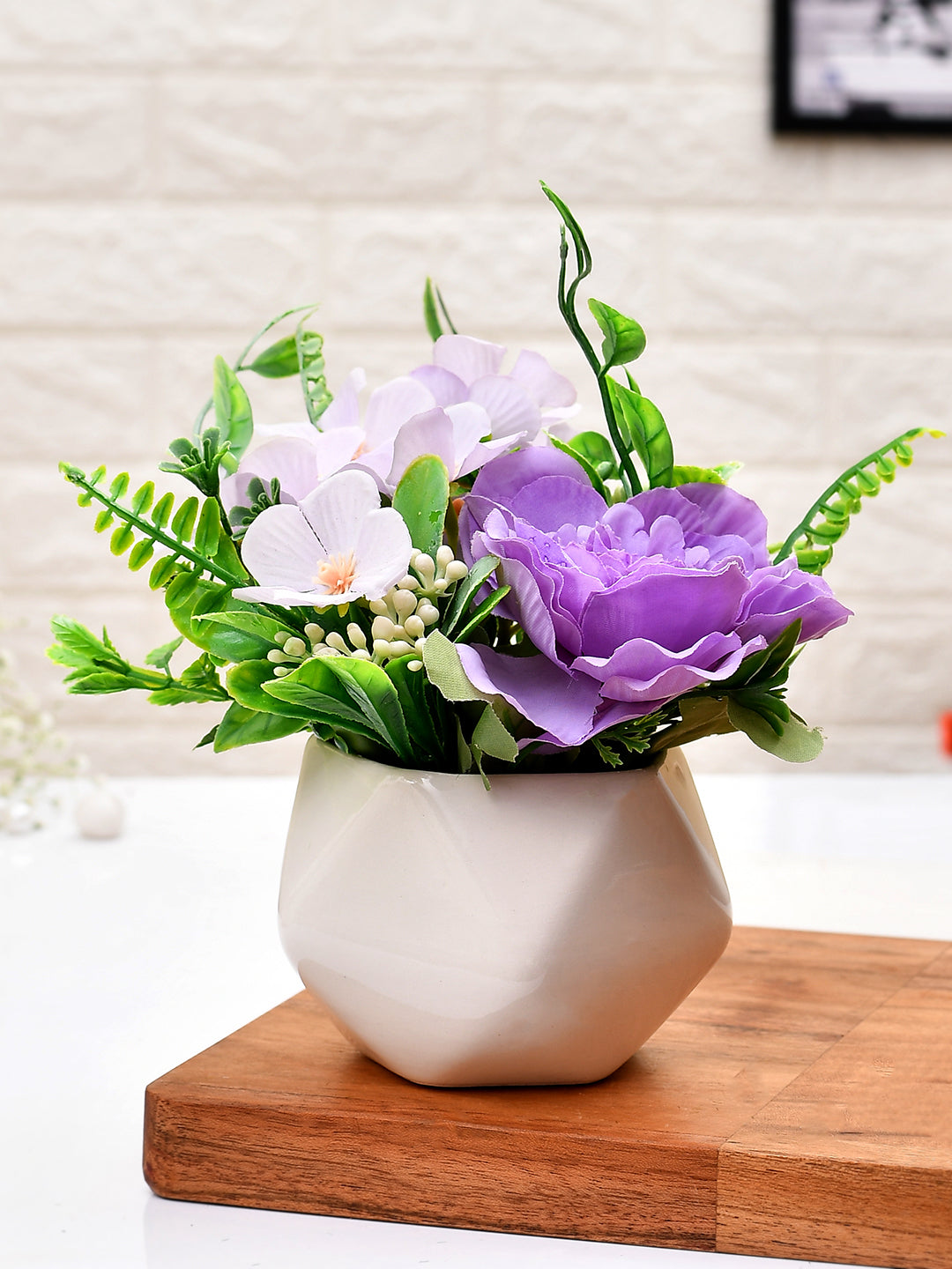 Artificial Flowers In A Diamond Pattern Planter