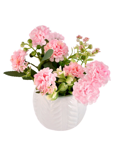 Artificial Pink Flowers with a White Textured Planter