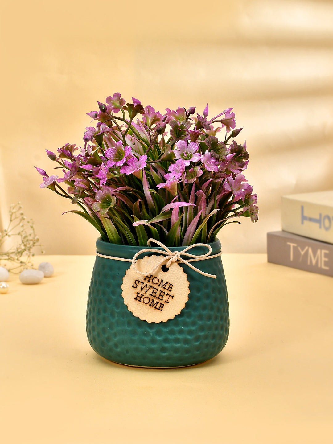 Artificial Purple Blossoms in Dotted Crimson Planter