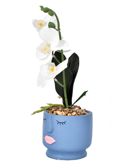 Artistic Blue Face Planter with White Artificial Orchids