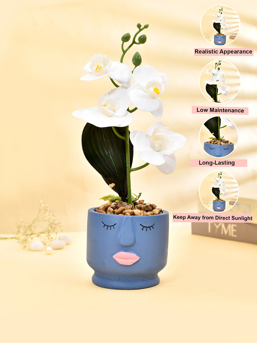 Artistic Blue Face Planter with White Artificial Orchids