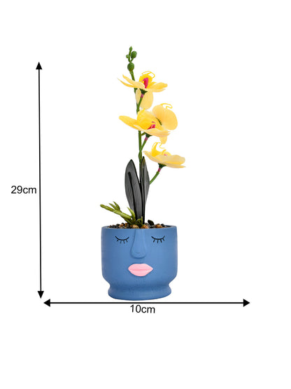 Artistic Blue Face Planter with Yellow Artificial Orchids