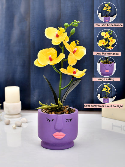 Artistic Purple Face Planter with Yellow Artificial Orchids