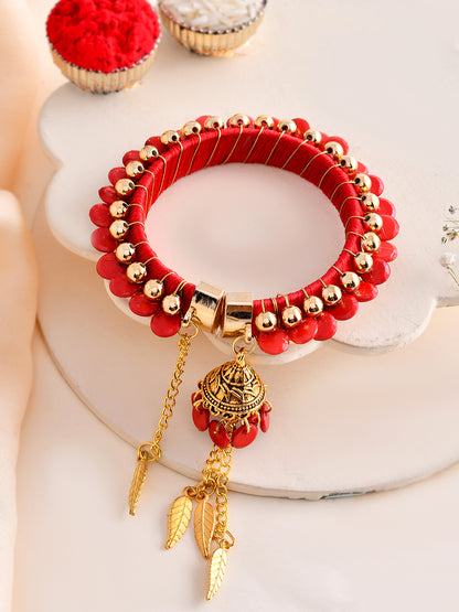 Classic Red Thread Bracelet Rakhi for Bhabhi with Gold Finish Latkan