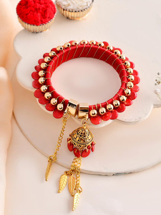Classic Red Thread Bracelet Rakhi for Bhabhi with Gold Finish Latkan