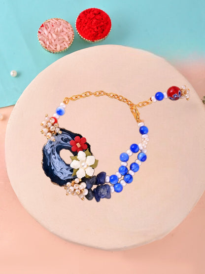 Handcrafted Blue Floral Resin Beaded Rakhi