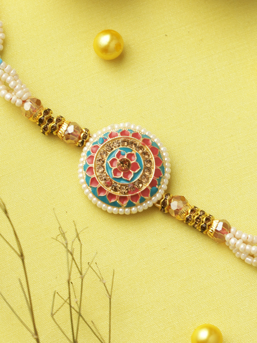 Blue-Pink Pearl Floral Designed Rakhi