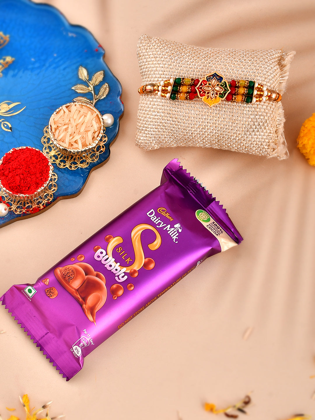 Handcrafted Rakhi with Dairy Milk Silk Bubbly