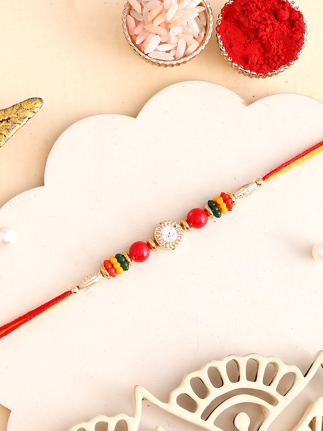 Floral Motif & Beads Studded Mauli Thread Rakhi