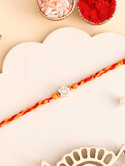 White Floral Motif Mauli Rakhi with Orange Beads