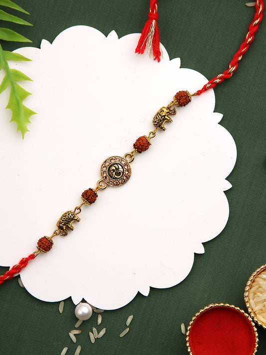 Golden Engraved Elephant Antique Rakhi