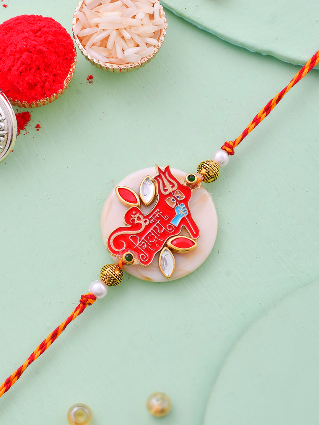 Auspicious Om Enameled Kundan Rakhi