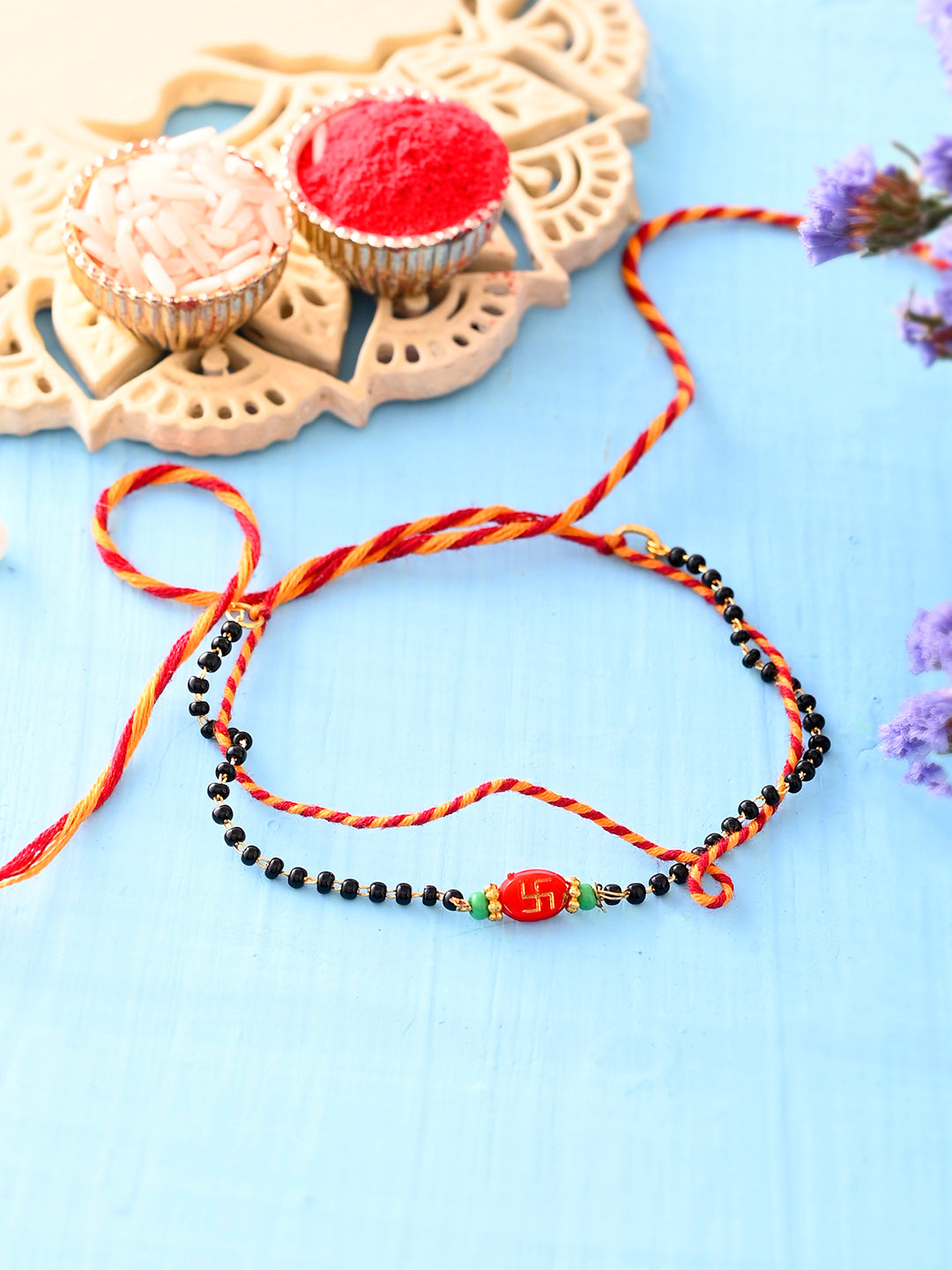 Protective Sattvik Nazarbattu Rakhi with Black Beads