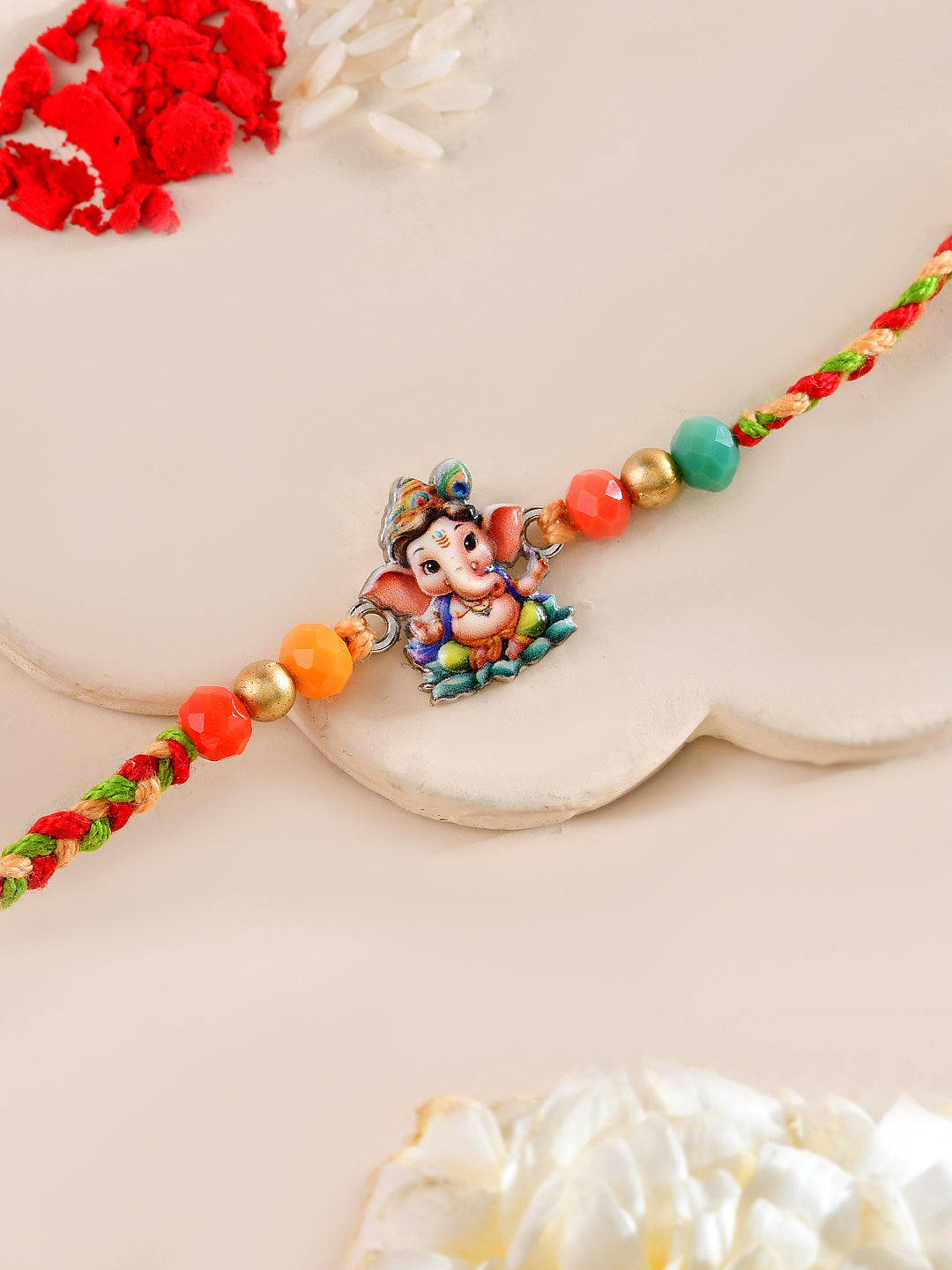 Bal Ganesha Rakhi for Bhai with Colorful Beads and Thread