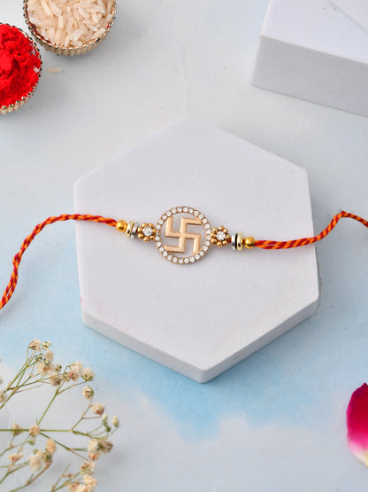 Swastik Rakhi with Stone-Studded Round Design and Sacred Thread