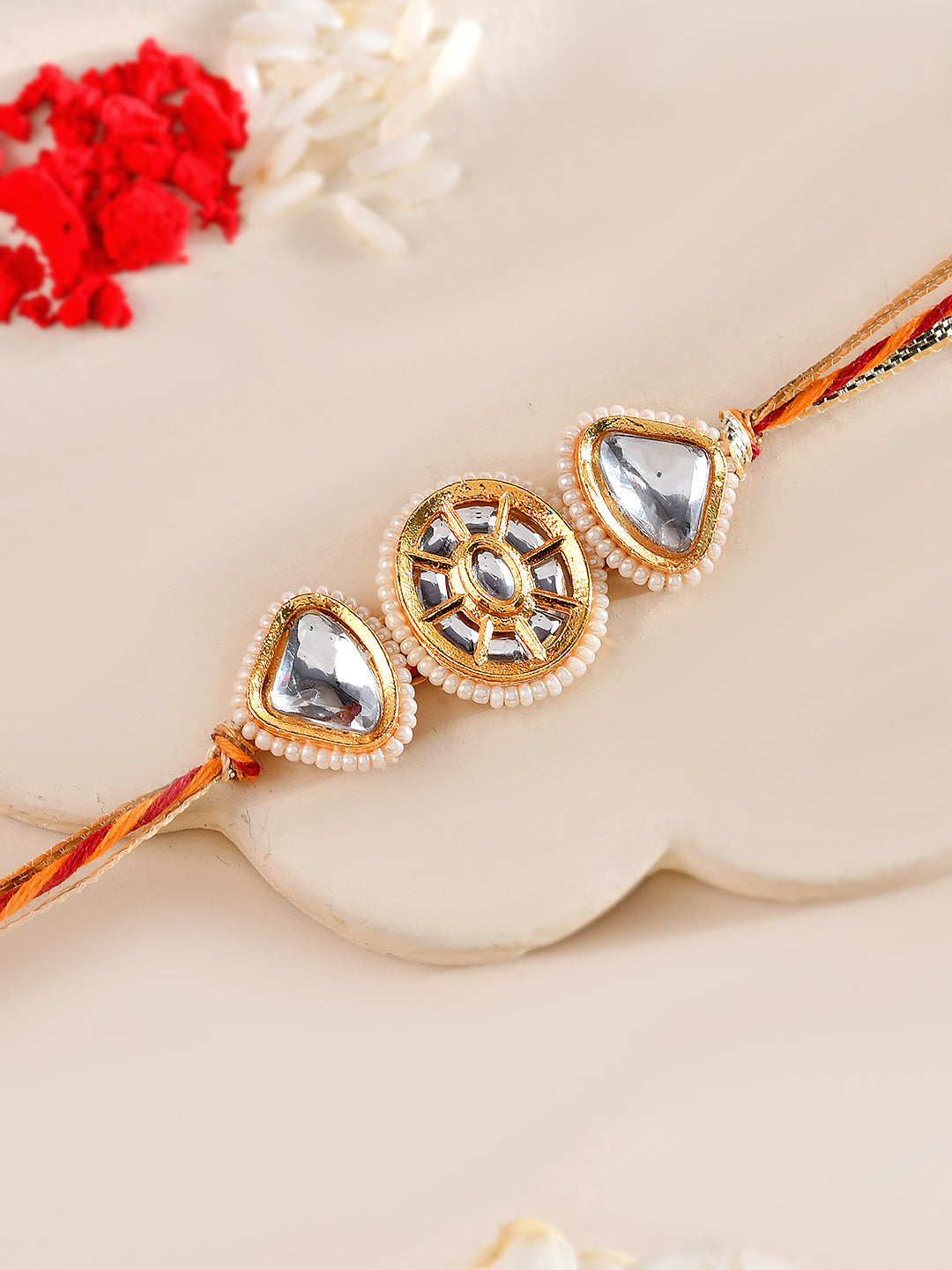 Kundan Rakhi with Tear Drop Stones and Ethnic Finish