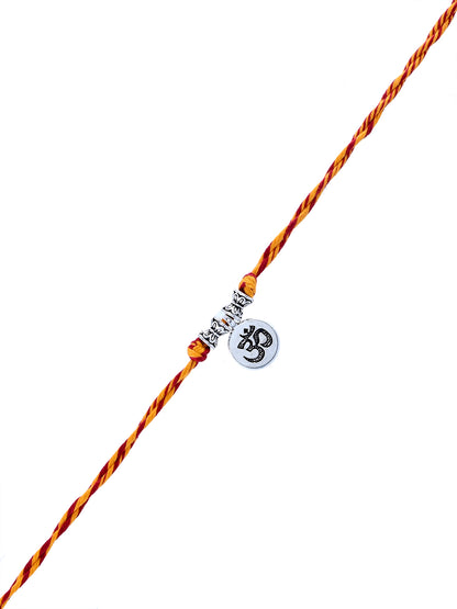 Om Symbol Rakhi with Braided Red Yellow Thread and Silver Charm