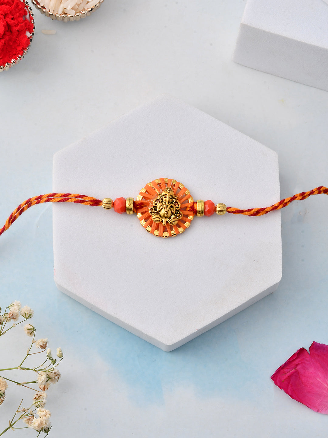 Auspicious Vinayak Rakhi with Circular Charm and Festive Detailing