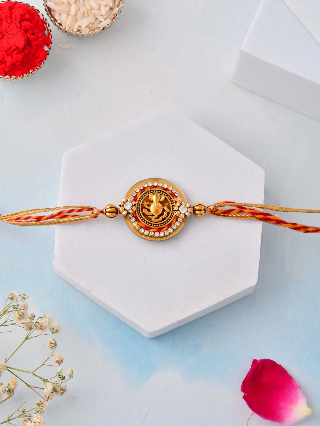Divine Vighnaharta Rakhi with Circular Stone Frame