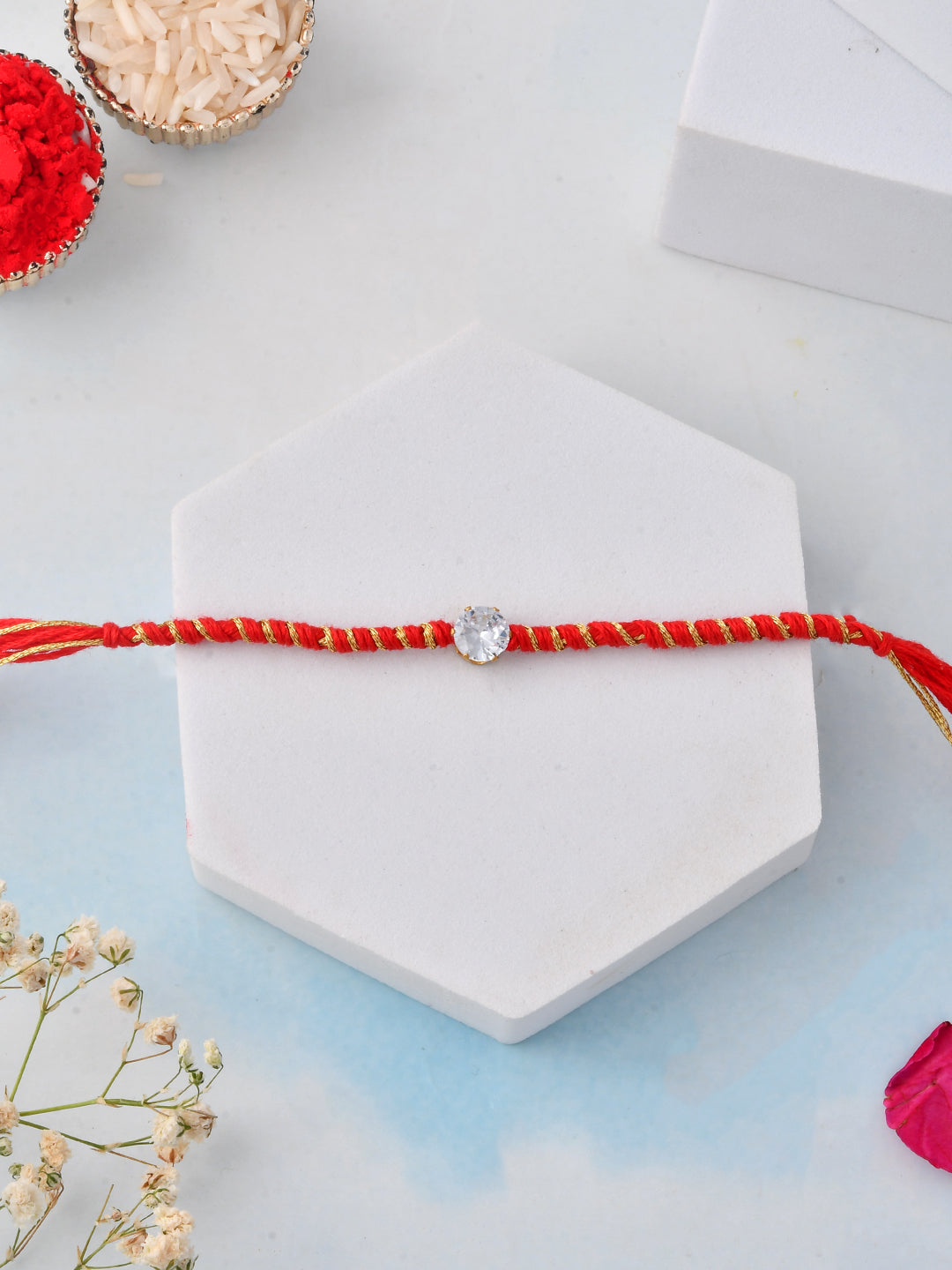 Minimal Solitaire Stone Rakhi on Red-Gold Thread