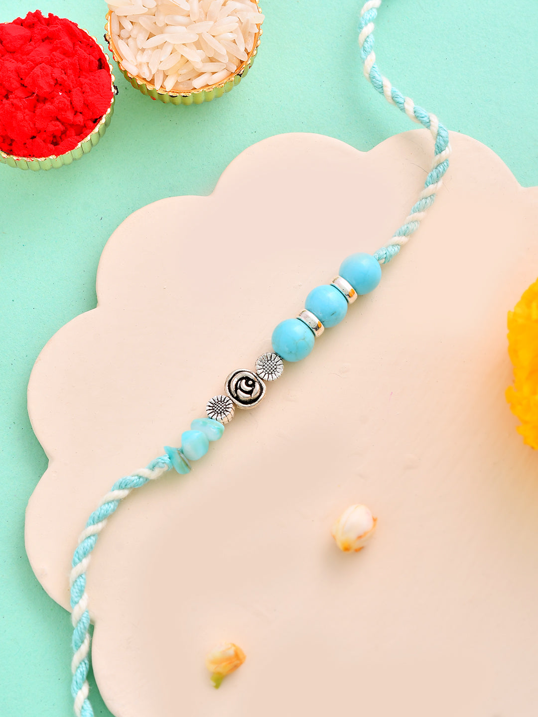Handcrafted Sky Blue Beaded Rakhi with Spiral Charm for Bhai