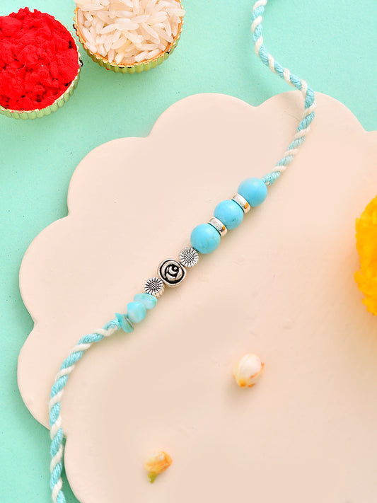 Handcrafted Sky Blue Beaded Rakhi with Spiral Charm for Bhai