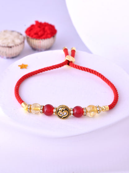 Traditional Red Thread Rakhi with Golden Heart Centerpiece