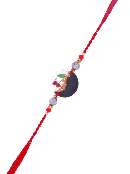 Black & Gold Resin Rakhi with Red Thread and Miniature Garden Scene