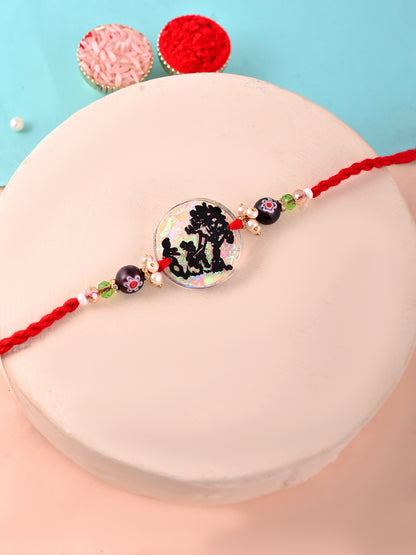 Shadow Art Resin Rakhi with Silhouette Scene and Pearlescent Base