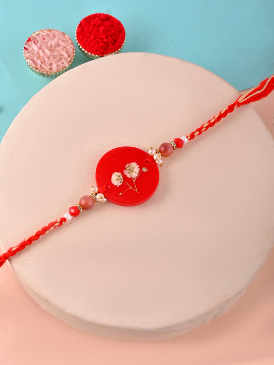 Minimal Red Floral Resin Rakhi with White Baby’s Breath