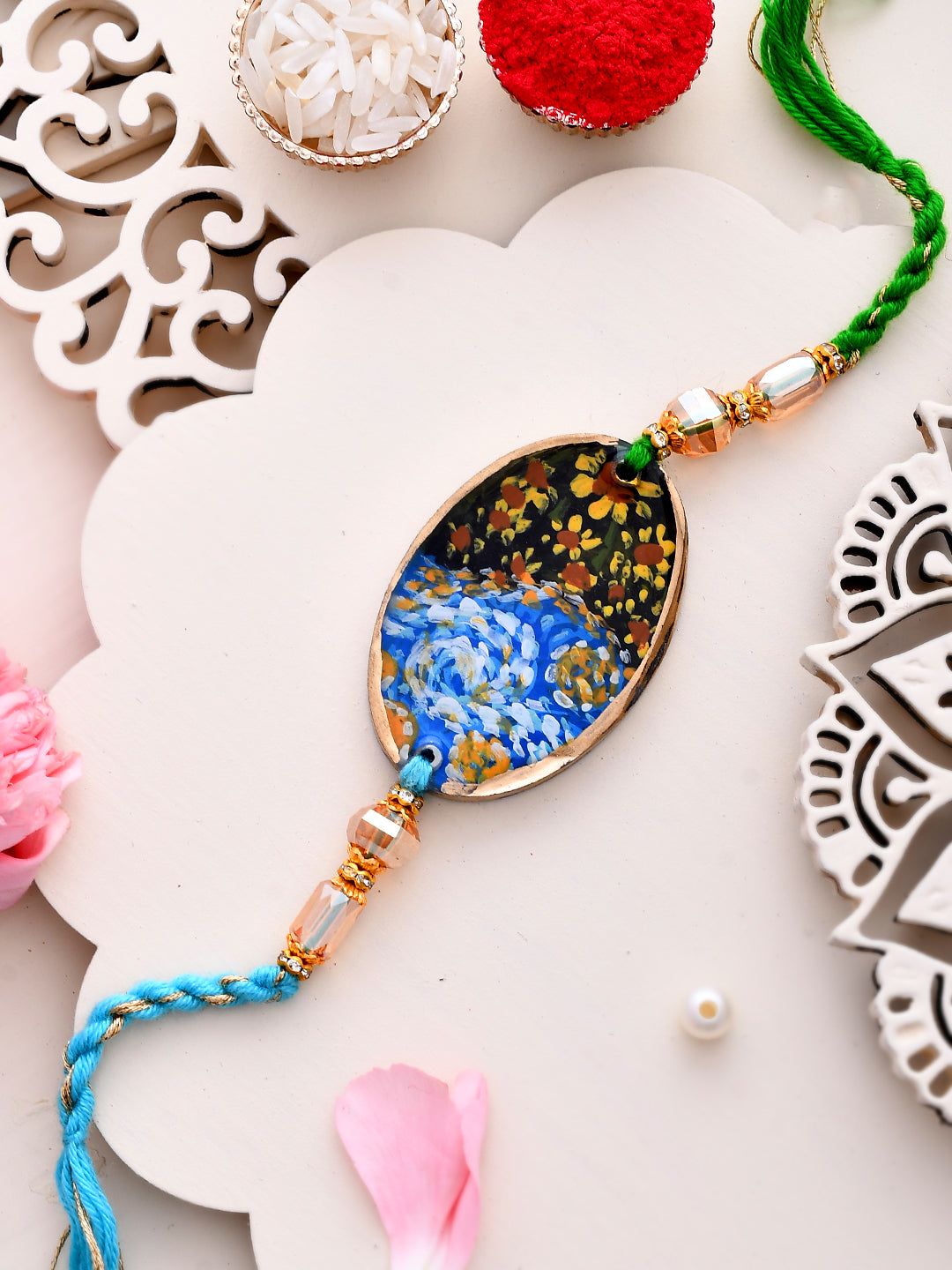 Beautiful Artwork of Flowers Blue & Green Twisted Rakhi