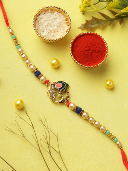 Regal Peacock Feather Pearl Rakhi