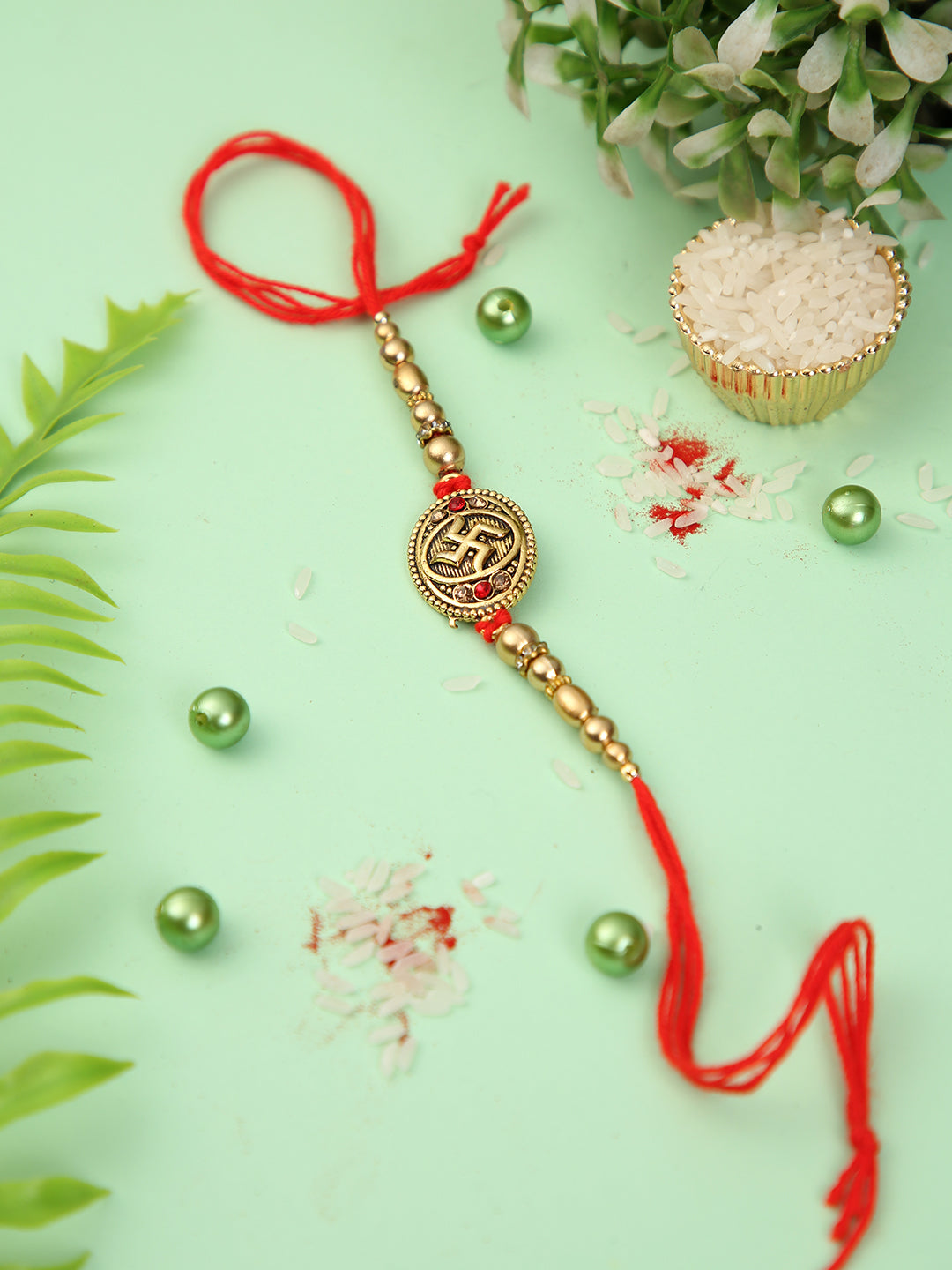 Golden Swastik Pearl Rakhi