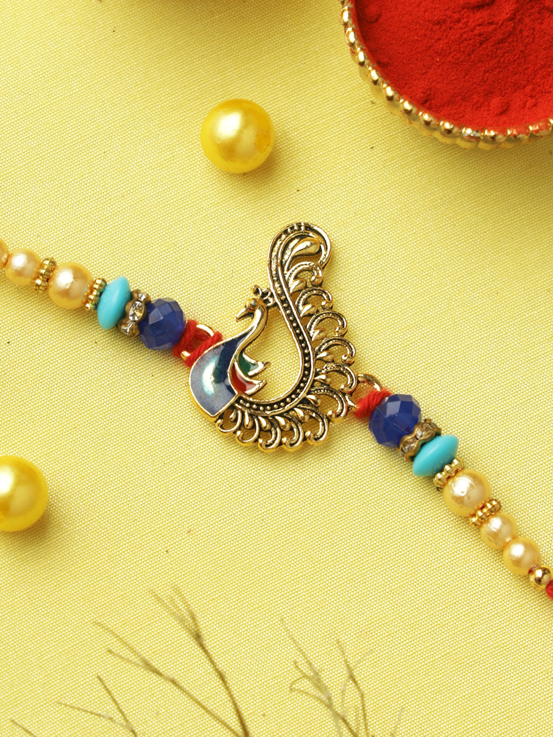 Peacock Charm Turquoise Pearl Rakhi
