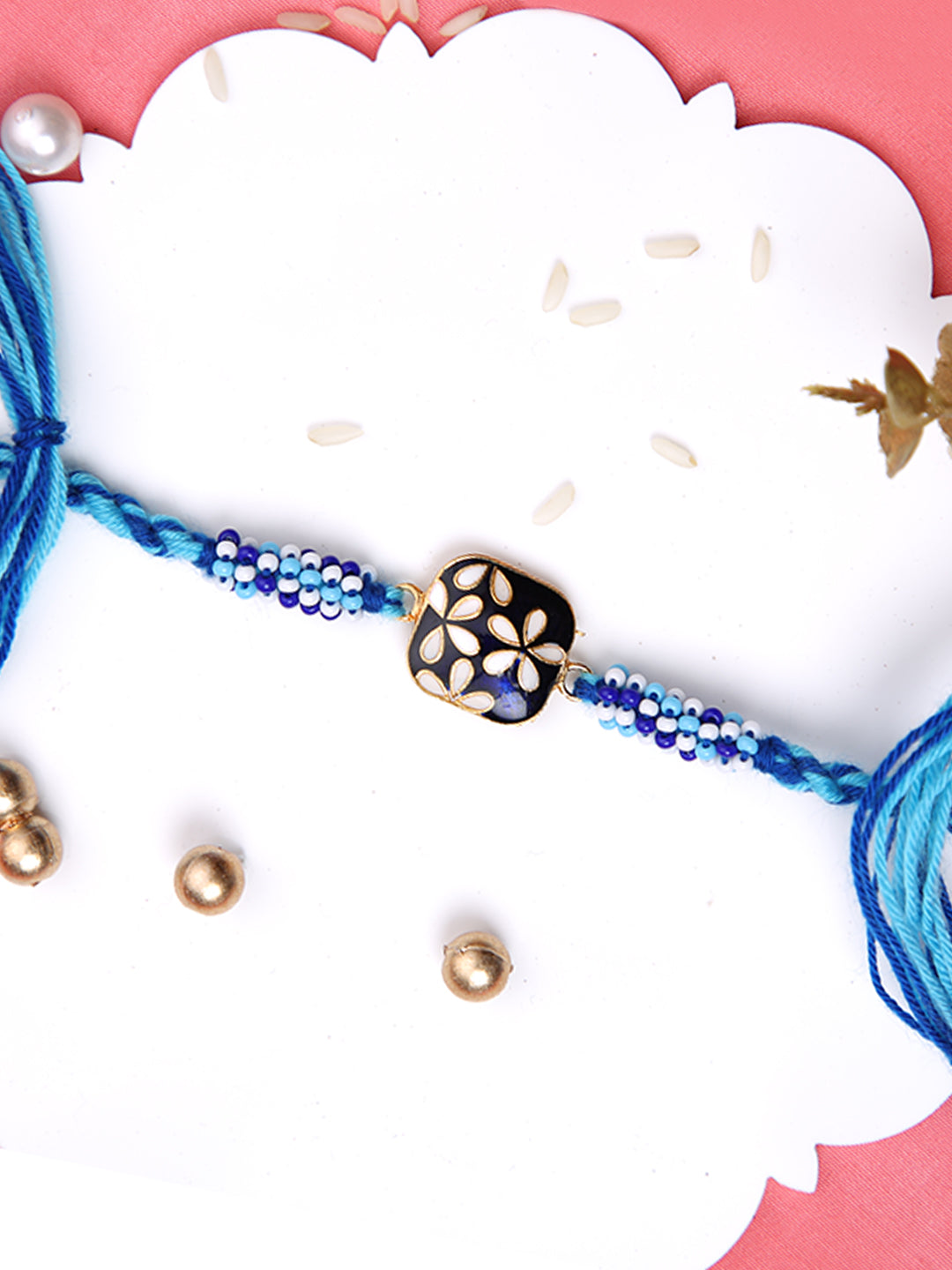 White Flroal Enameled Blue Single Rakhi