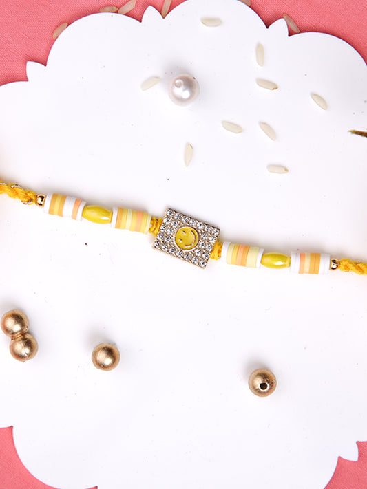 Yellow Smiley Stone Studded Rakhi