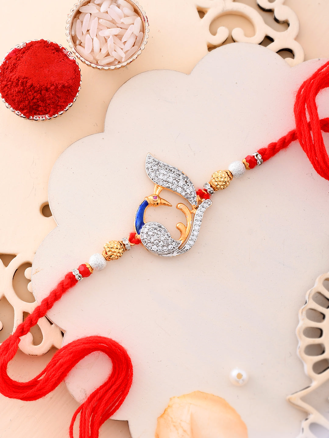 AD Stone studded Peacock Multistrand Rakhi