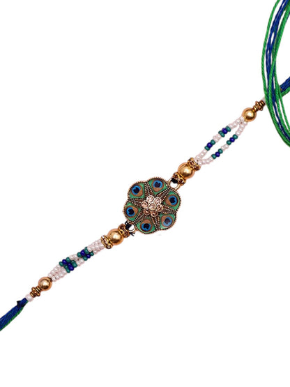 Ethnic Peacock-Toned Rakhi with Traditional Blue-Green Centerpiece