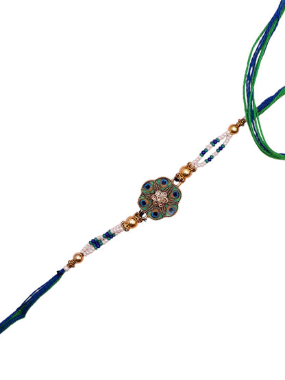 Ethnic Peacock-Toned Rakhi with Traditional Blue-Green Centerpiece