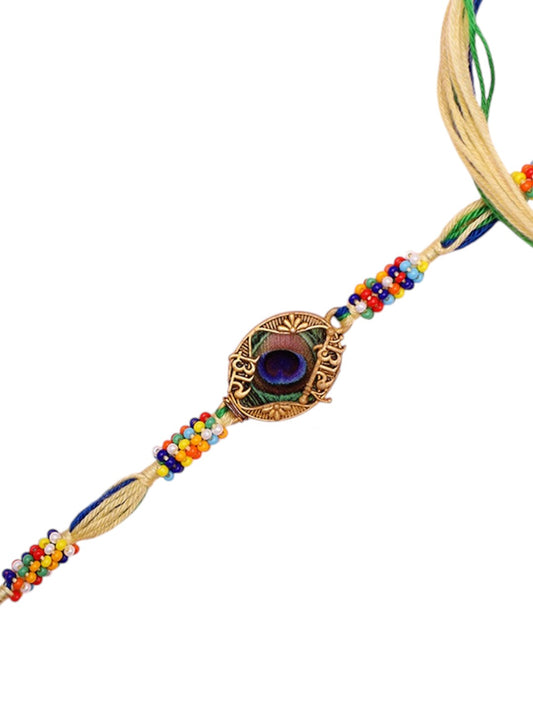 Traditional Rakhi with Artistic Mor Pankh Motif and Festive Beading