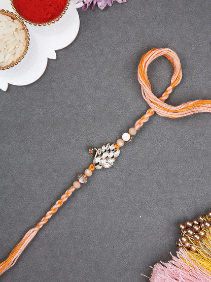 Elegant Swan Rakhi with Crystal Accents on Peach Silk Thread