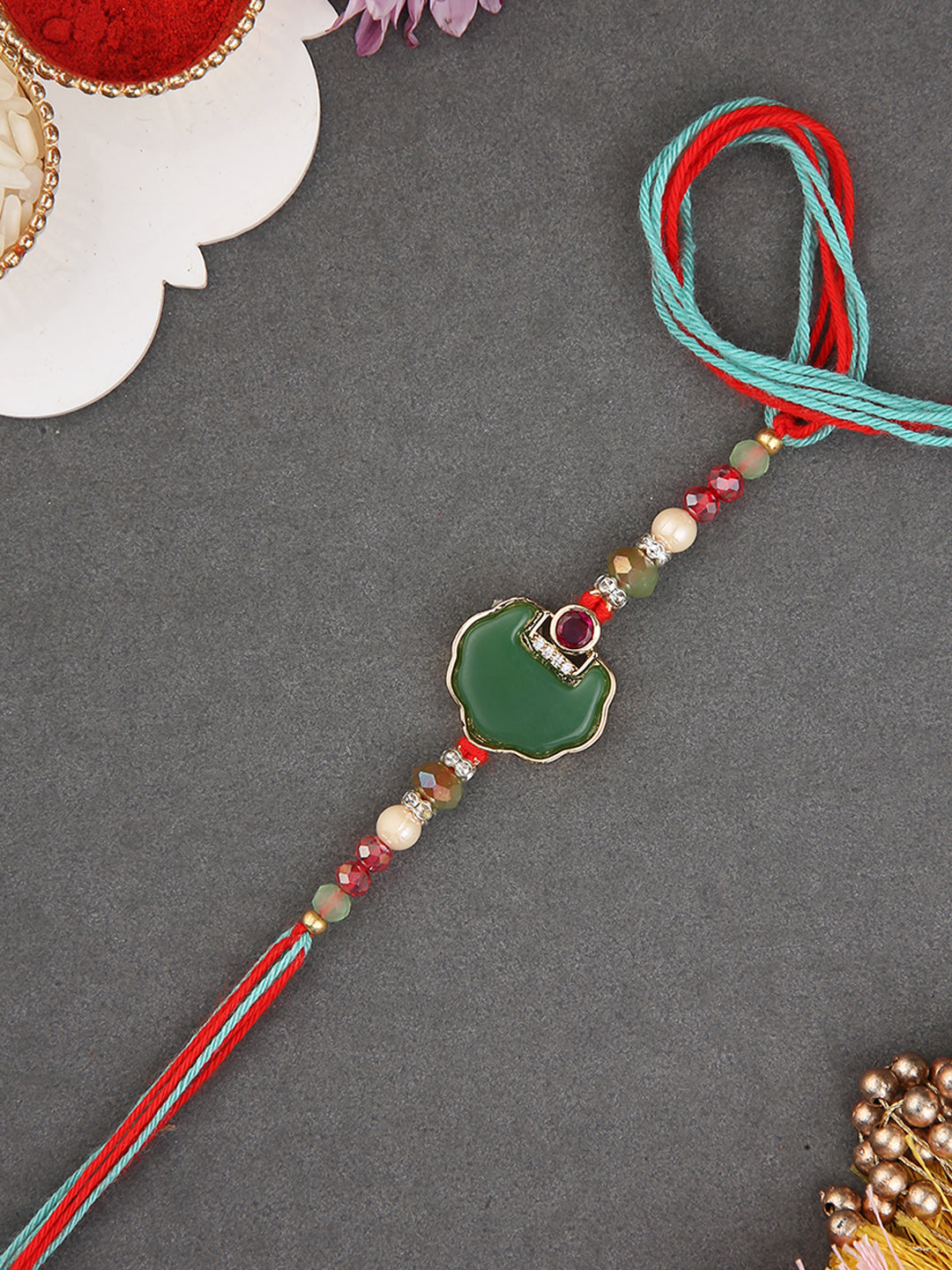 Handcrafted Beads Rakhi with Traditional Green Enamel and Stone Work