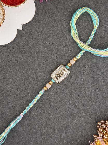 Elegant Handcrafted Rakhi with Subtle Shine and Pastel Weave