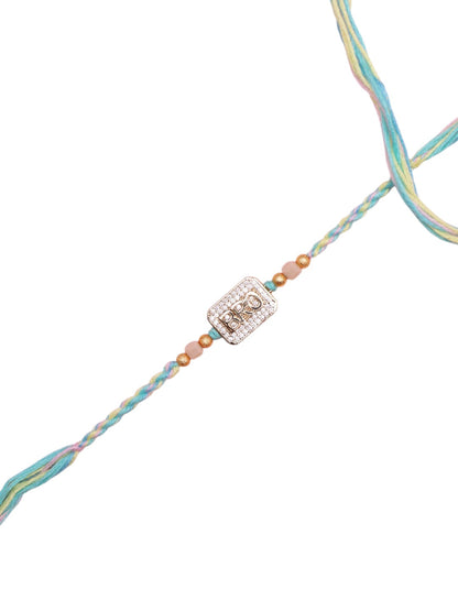 Elegant Handcrafted Rakhi with Subtle Shine and Pastel Weave
