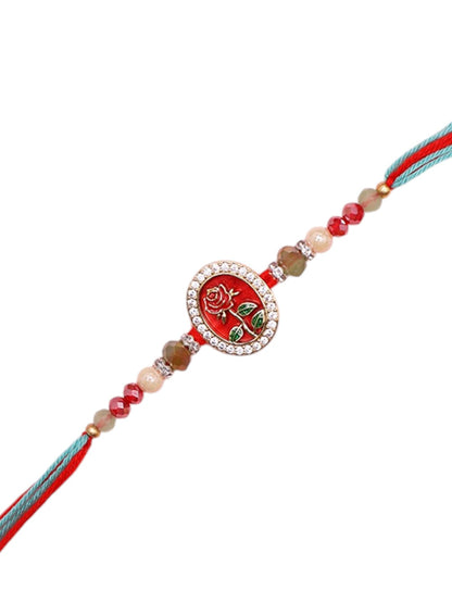 Festive Oval Rakhi with Enamel Detailing and Beaded Thread