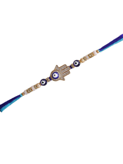 A blue thread Rakhi with a Hamsa hand and evil eye charms,