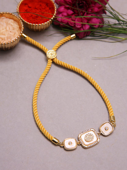 Handmade Festive Rakhi With Yellow Cord And Royal Trio Centerpiece
